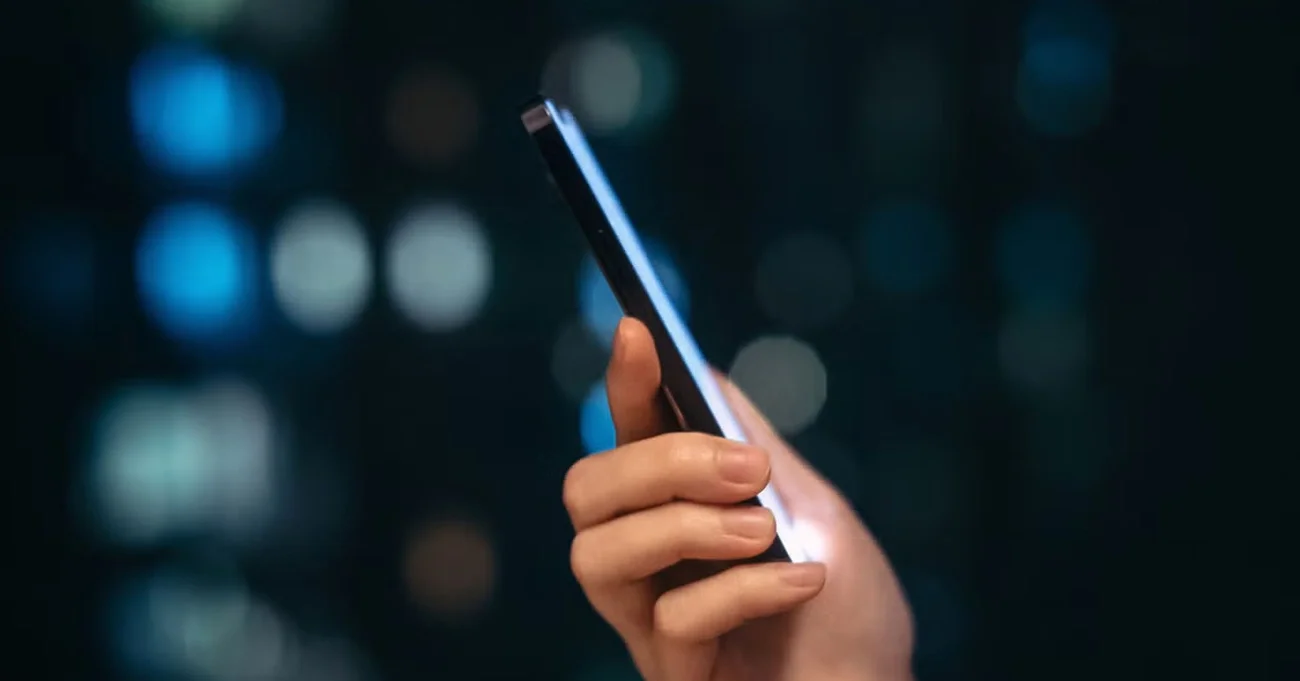 person holding cell phone